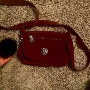 Brand new original “ Kipling “ purse.